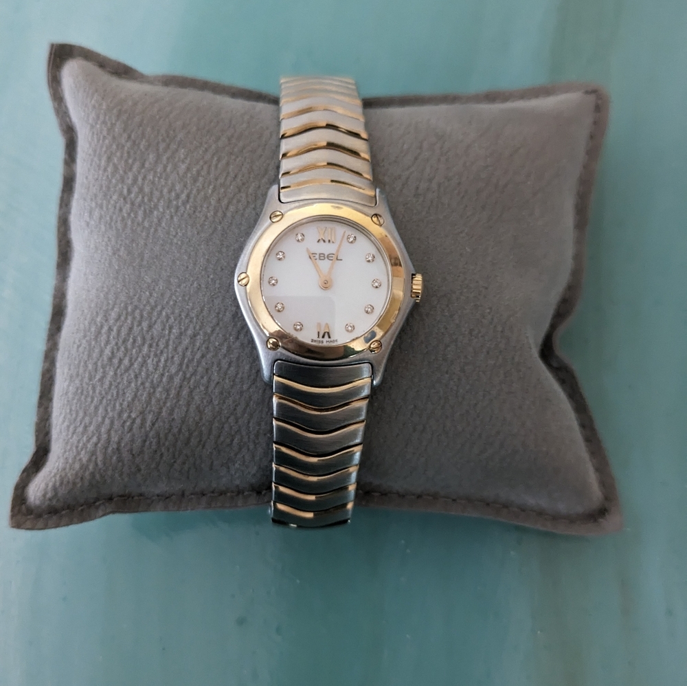 Stainless & 18k wave ladies ebel watch, MOP face with diamond numbers. Appx 6.5"